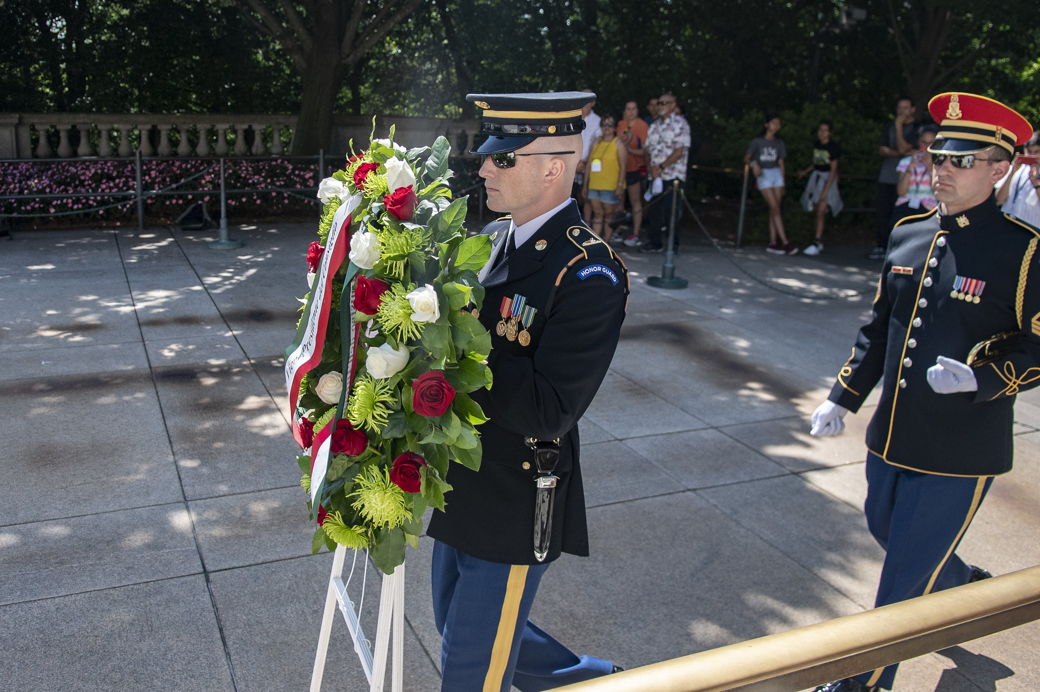 A uniformed soldier plans to lay a wreath at the Tomb of the Unknown Soldier