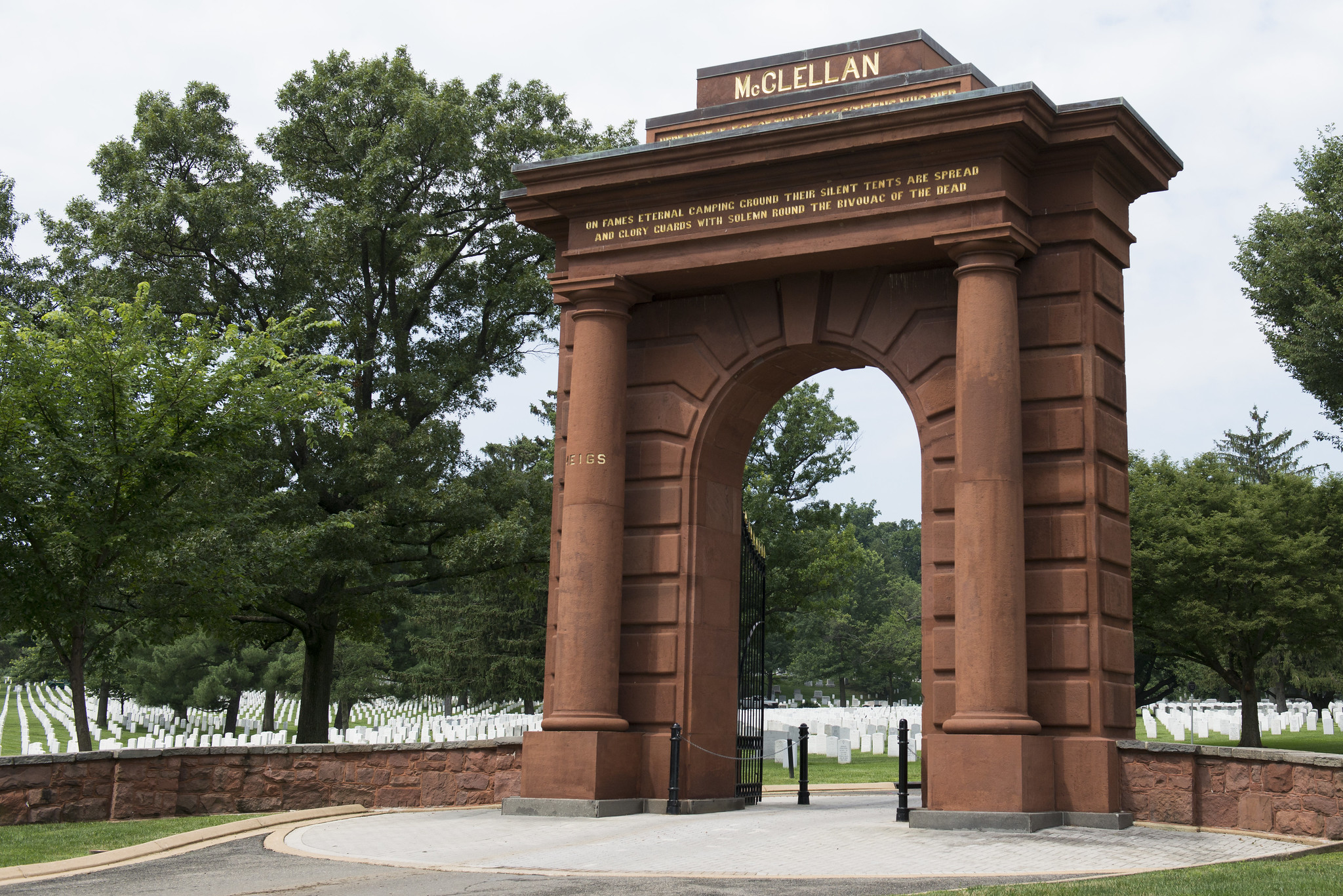 McClellan Gate, with rows of white marble headstones in the background