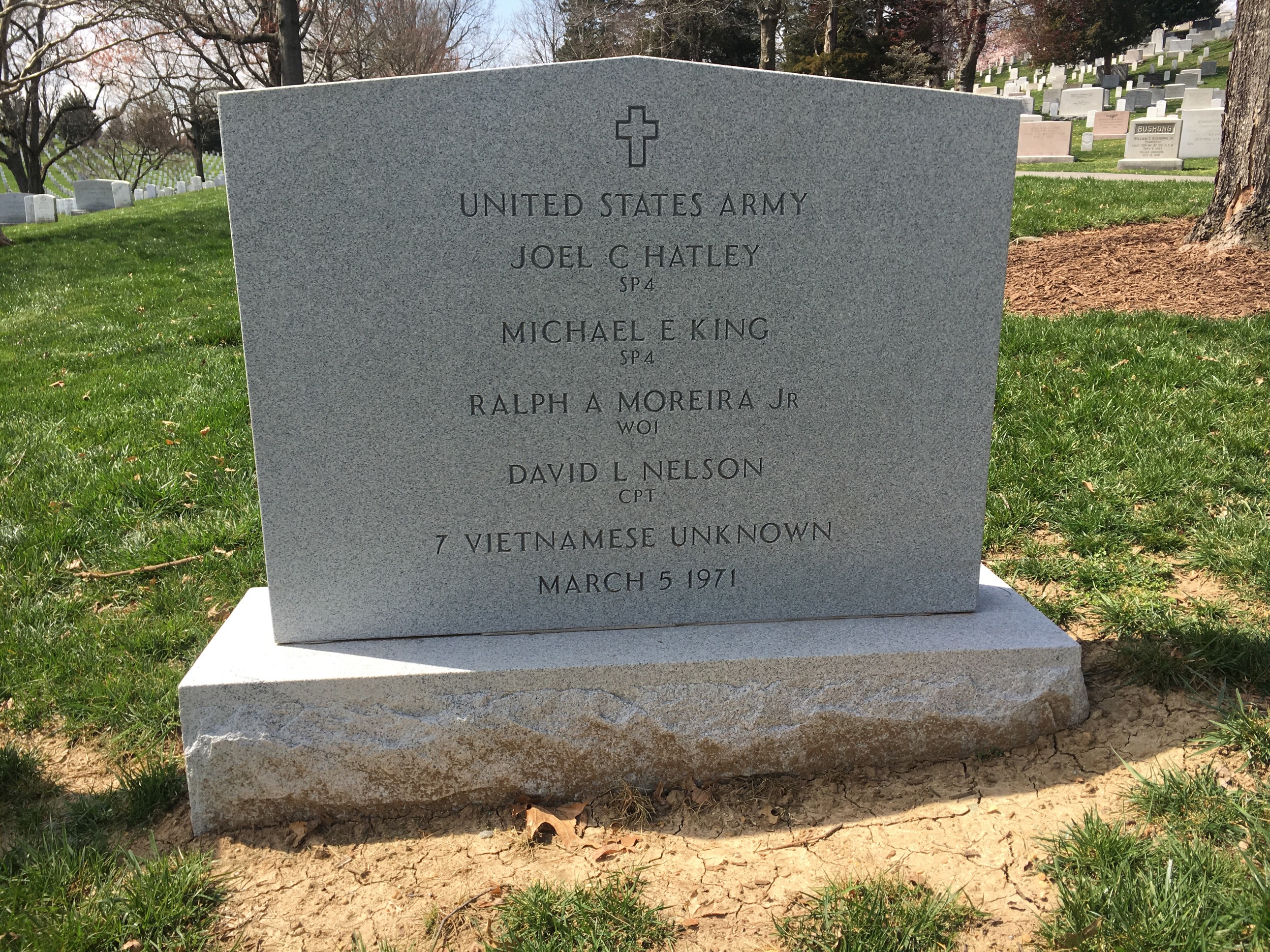 Headstone for a group burial that includes seven unknown South Vietnamese service members
